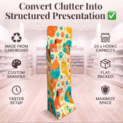 A freestanding cardboard euro hook retail display stand with a colorful cat-themed print, shown in a blurred store interior. Large text at the top reads 'Convert Clutter Into Structured Presentation,' and callout icons around the stand mention cardboard construction, custom branding, 20 hook capacity, flat packing, faster setup, and space maximization.